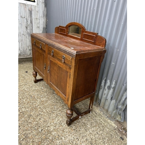 13 - An early 20th century oak sideboard 120cm wide