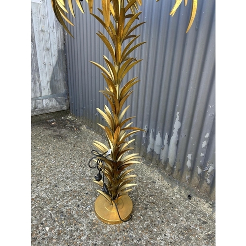 59 - A floor standing palm tree standard lamp