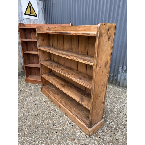 89 - Two country pine open fronted bookcases (larger one 128x25x118)