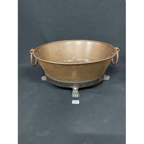 1034 - Oval Rusty Iron planter on paw feet, width 64 x height 24 cms