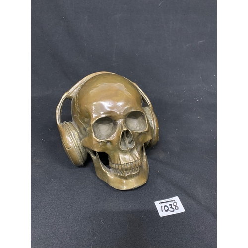 1038 - Bronze Skull with headphones height 17 cms