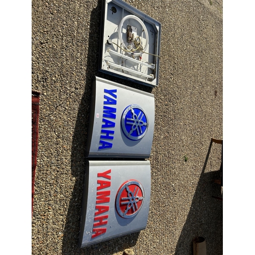 103 - 2 Yamaha shop signs and 1 illuminating backing