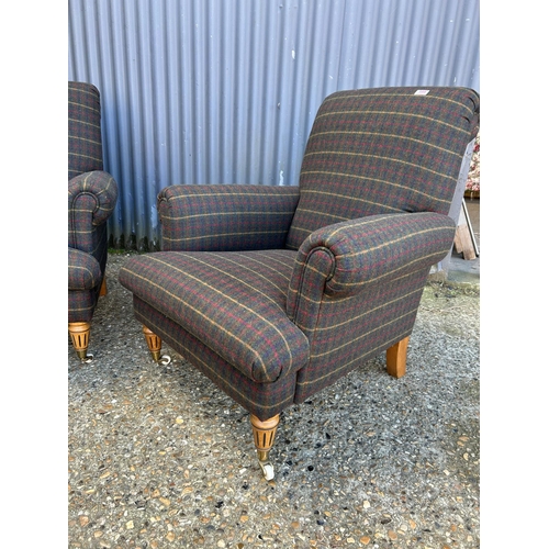 109 - Pair of green tartan pattern armchairs