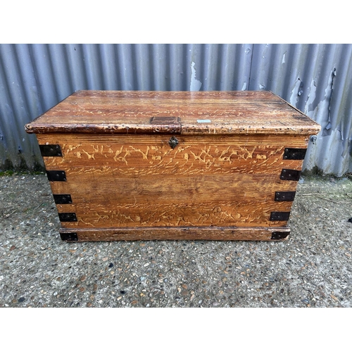 11 - An antique pine blanket box chest