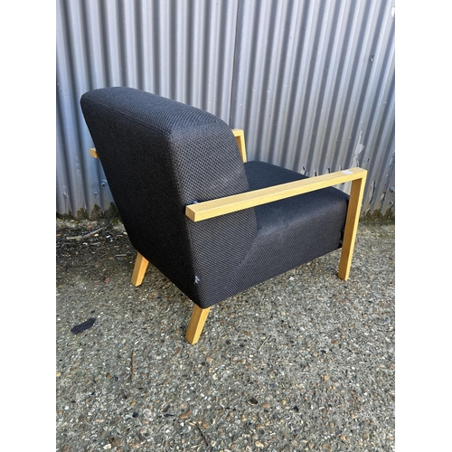 110 - Modern black upholstered designer armchair by SITS