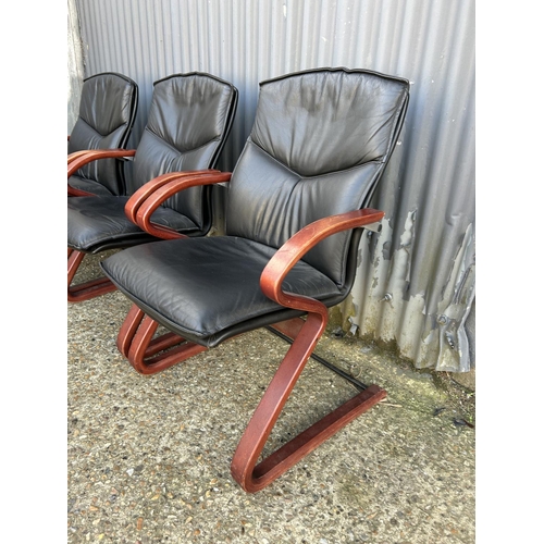 127 - Set of four modern black leather cantilever chairs