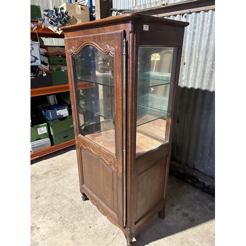 167 - A continental oak glazed single door display cabinet 78x46x16795