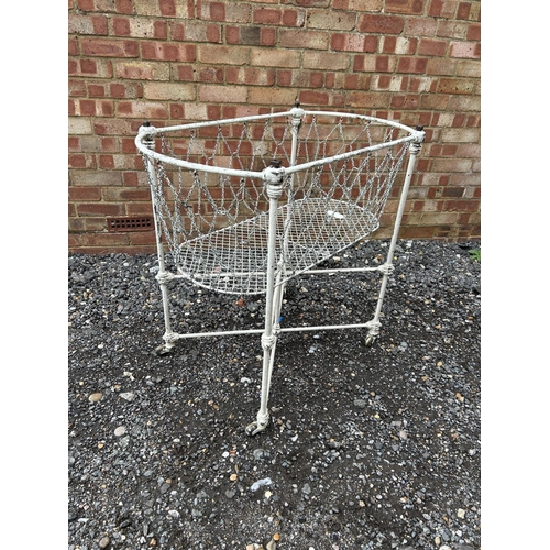 26 - A vintage white painted patent metal crib