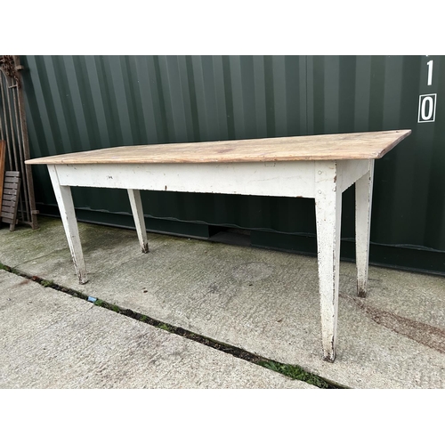 350 - A french style pine table with white painted tapered legs 183x67x76