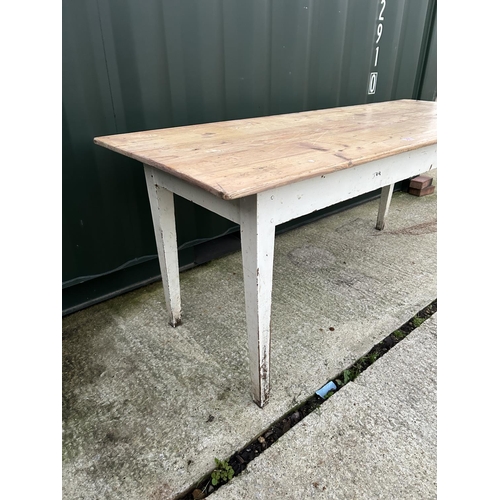 350 - A french style pine table with white painted tapered legs 183x67x76