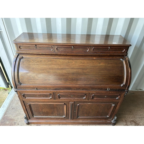 353 - A continental rosewood cylinder top bureau desk 130x60x90