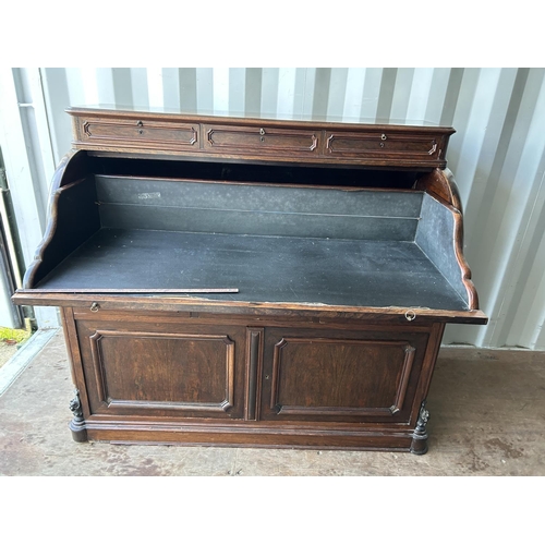 353 - A continental rosewood cylinder top bureau desk 130x60x90