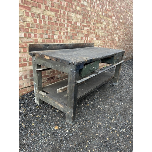 38 - A very large industrial workbench  / desk with two drawers 183 x80x77