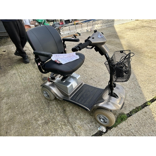 392 - A ZEOSPORT mobility scooter with key and charger in worker order, together with purchase invoice (ov... 