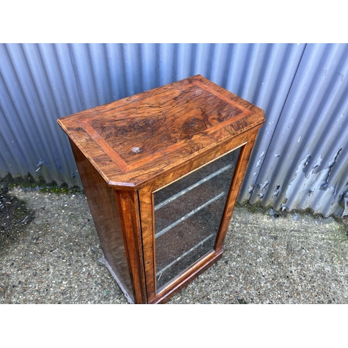 53 - A victorian walnut inlaid music cabinet