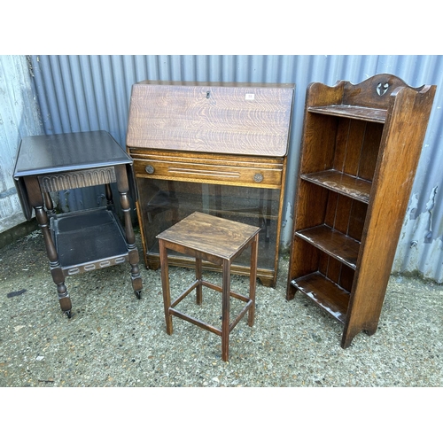 59 - A slim oak bureau, small oak bookcase, tea trolley and a small side tabe