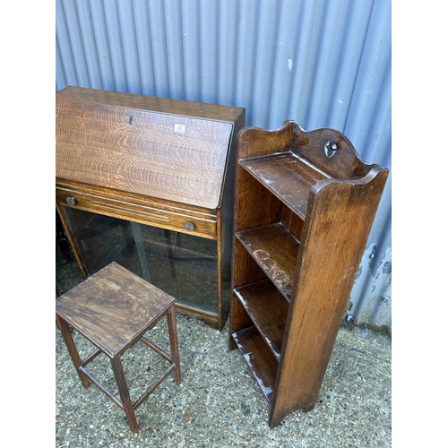 59 - A slim oak bureau, small oak bookcase, tea trolley and a small side tabe