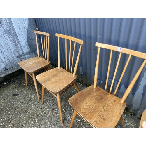 64 - A set of four ercol light elm kitchen chairs