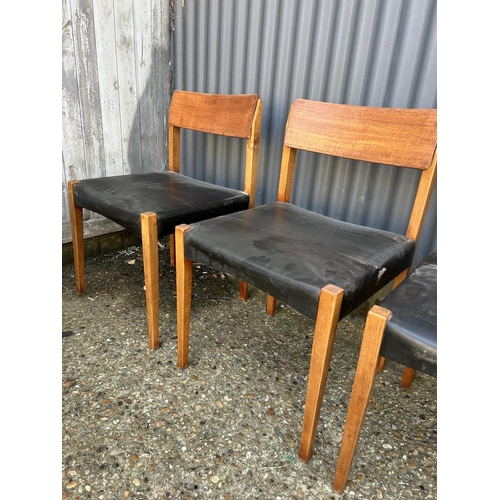 84 - Set of four Danish style dining chairs with black vinyl seats