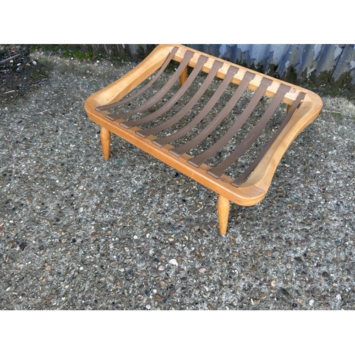 85 - Ercol light elm foot stool stand