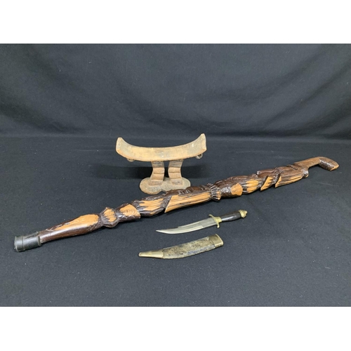 509 - Oriental Carved neck rest, carved hardwood stick and Indian dagger