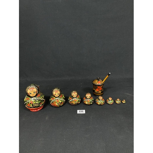 696 - Painted wooden Christmas Russian doll (set of 8)  tallest doll 14 cms and Russian pot