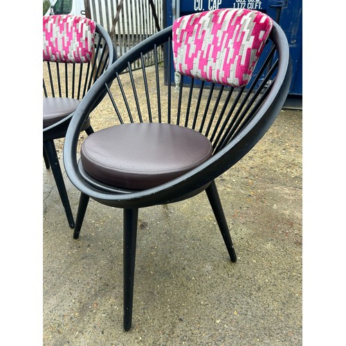 50A - A set of four pink upholstered VITRA style designer chairs