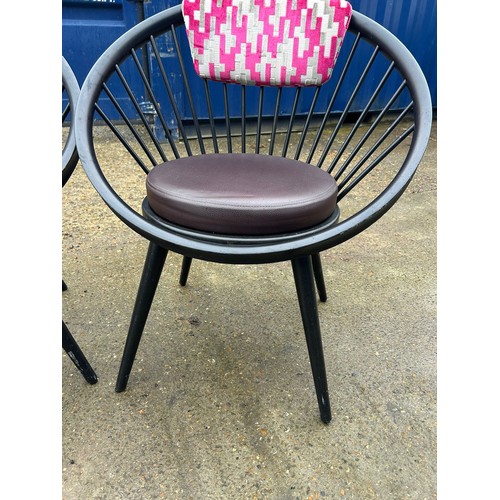 50A - A set of four pink upholstered VITRA style designer chairs