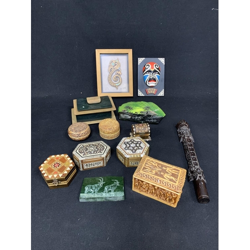 717 - Carved wooden and other trinket boxes, plaques, carved wooden instrument