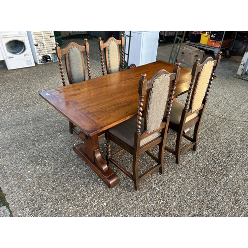89 - An oak refectory style dining table together with four oak barley twist dining chairs, recently upho... 