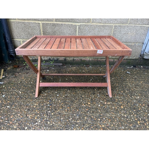 101 - A hardwood garden tray top drinks table on folding base