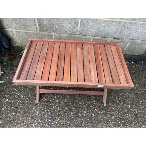 101 - A hardwood garden tray top drinks table on folding base