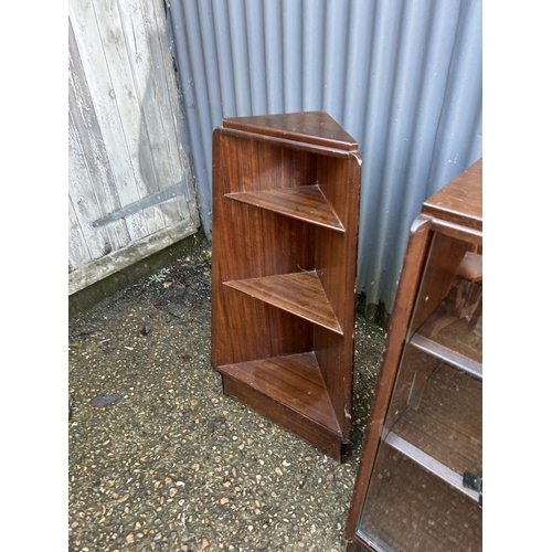 103 - A g plan glazed bookcase together with a matching corner bookcase