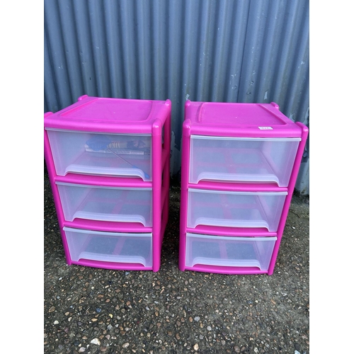 105 - A pair of modern pink plastic storage drawers