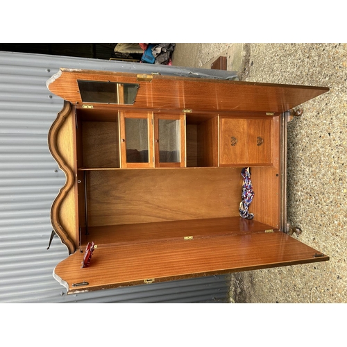 106 - A burr walnut gents wardrobe with double arch top and fitted interior 92x55x180