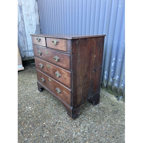 10 - An Antique oak chest of five drawers 77x42x78