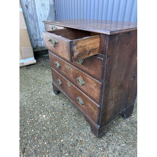 10 - An Antique oak chest of five drawers 77x42x78
