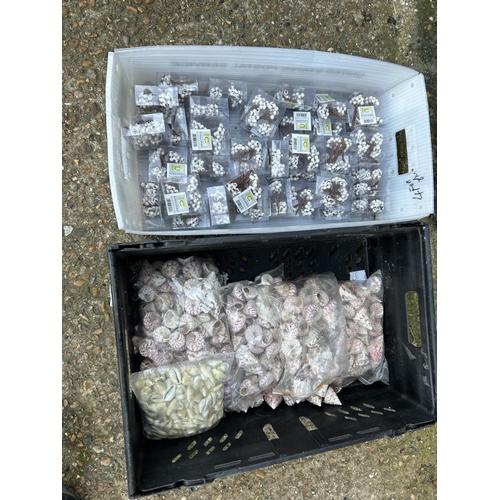 135 - Two trays of decorative shells etc