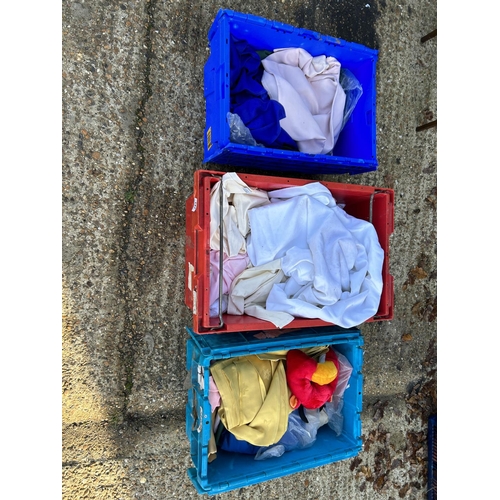 147 - Three crates of table linen, assorted sizes and colours