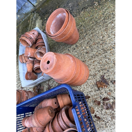 149 - Two crates of terracotta garden pots