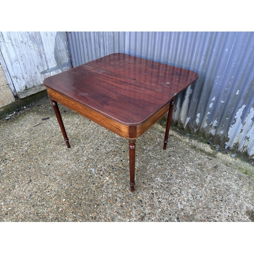 161 - A victorian mahogany fold over tea table
