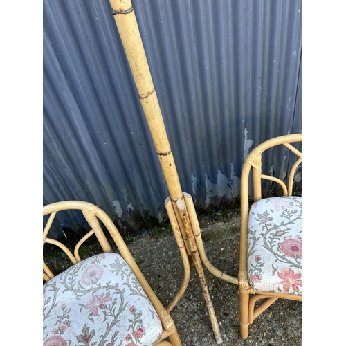 163 - A vintage bamboo hallstand together with two bamboo chairs