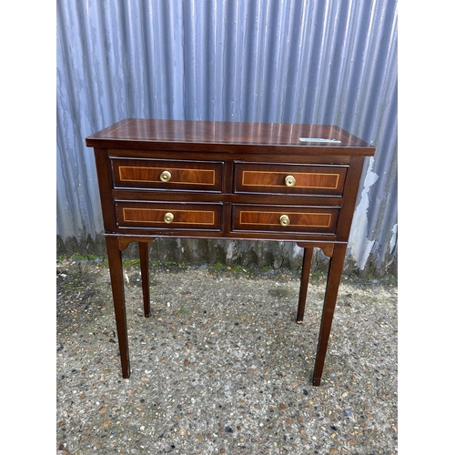 164 - A repro mahogany four drawer hall table