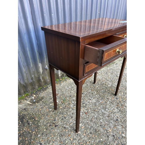164 - A repro mahogany four drawer hall table