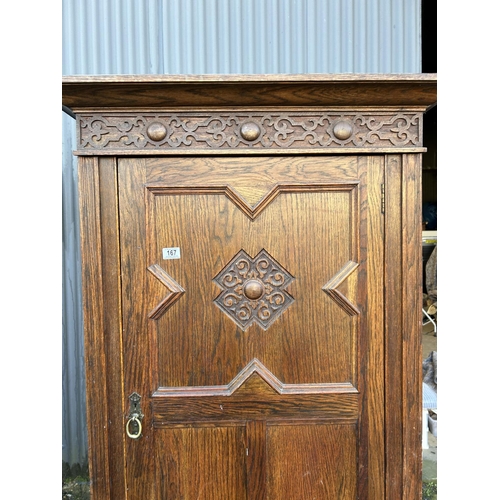 167 - An early 20th centuey oak single door wardrobe 77x42x194