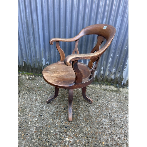 173 - A victorian mahogany swivel desk chair