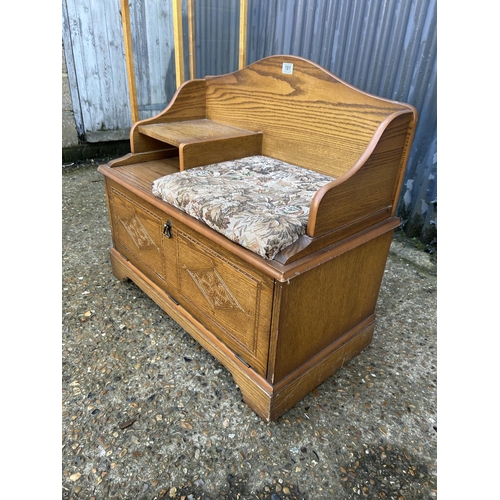 181 - An old charm style oak hall seat