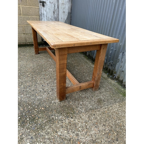 221 - A good quality hand made Elm refectory dining table 196x74x74