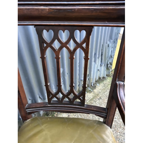 231 - A victorian mahogany carver chair with green leather seat