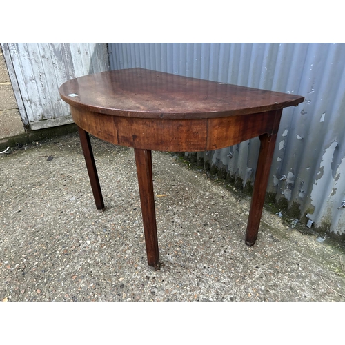 232 - A georgian mahogany demi lune table